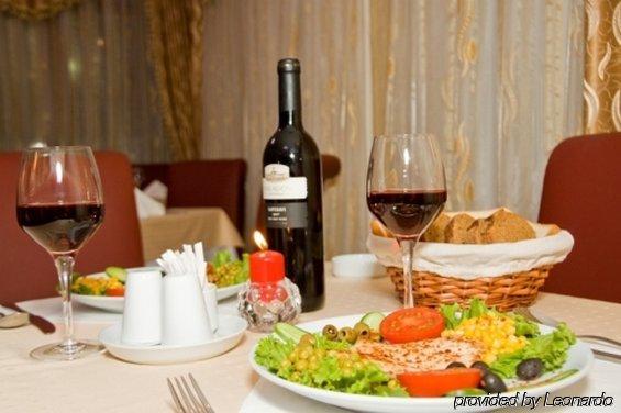City Palace Hotel باكو المطعم الصورة
